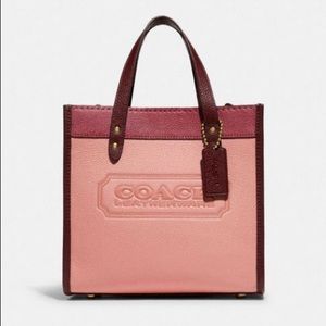 New pink Coach leather crossbody purse. Never used